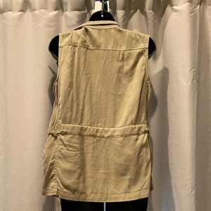 Sleeveless beige jacket